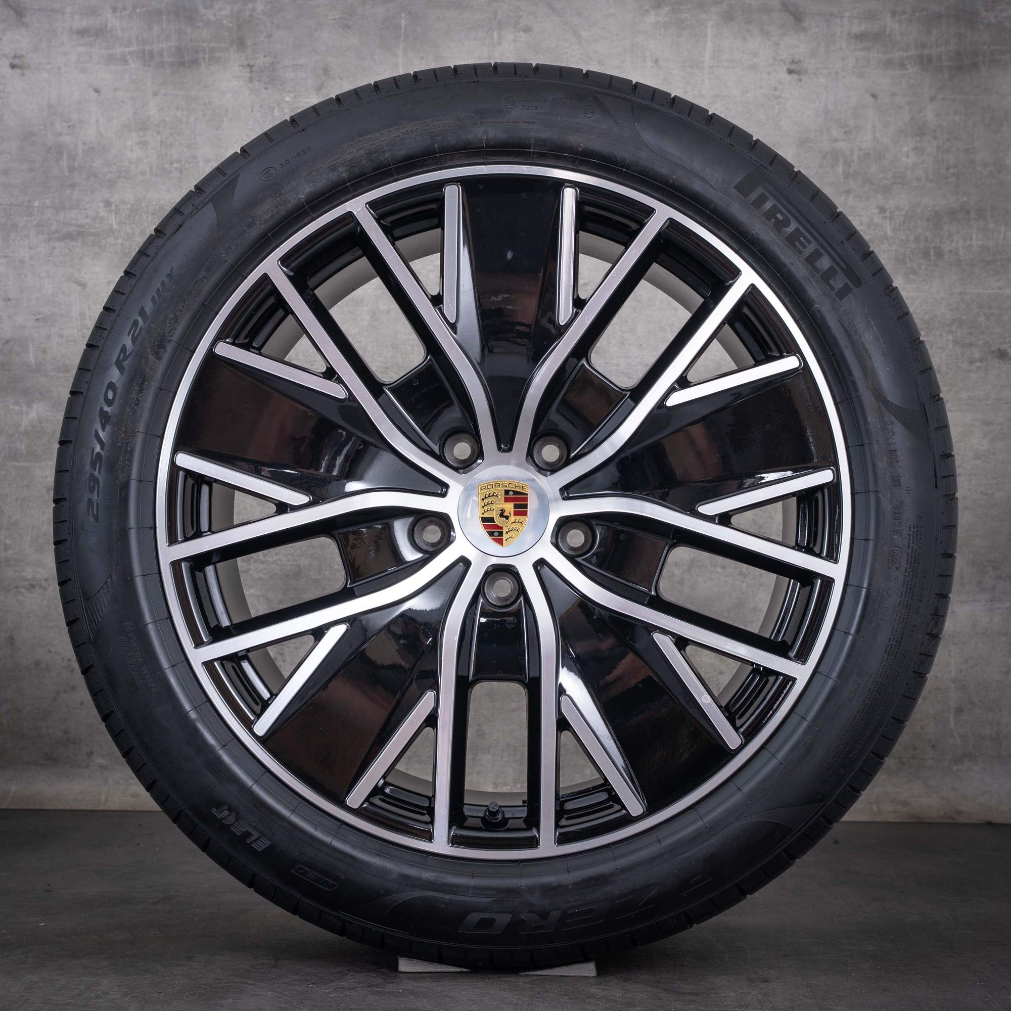 Oryginalne felgi Porsche Macan 21 cali H2 Electric – opony letnie 95C044660D czarne z efektem diamond cut
