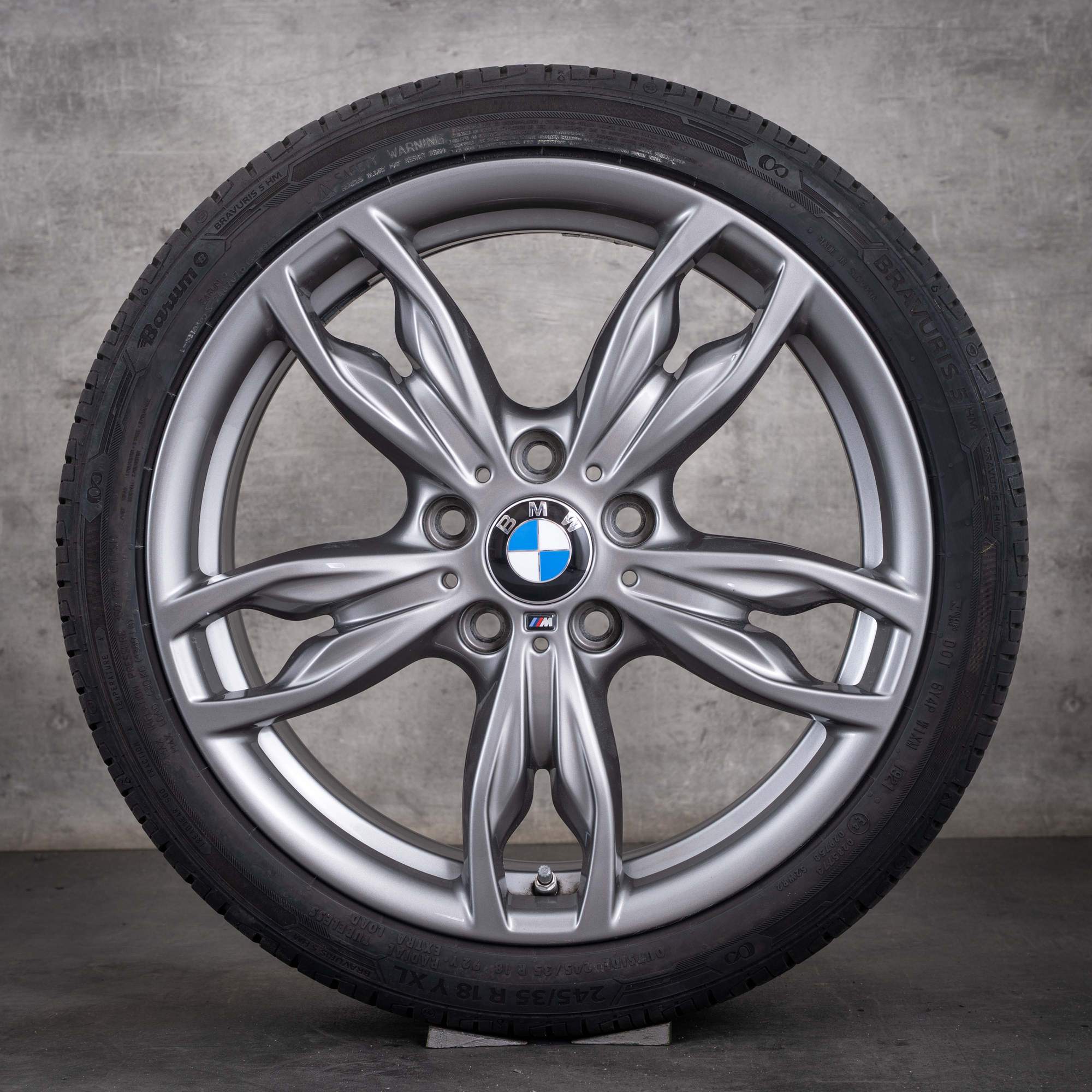 Oryginalne koła zimowe BMW serii 1 i Serii 2 18 cali F20 F21 F22 F23 felgi stylizowane 437 M 7847413 7847414 kolor orbit grey metallic