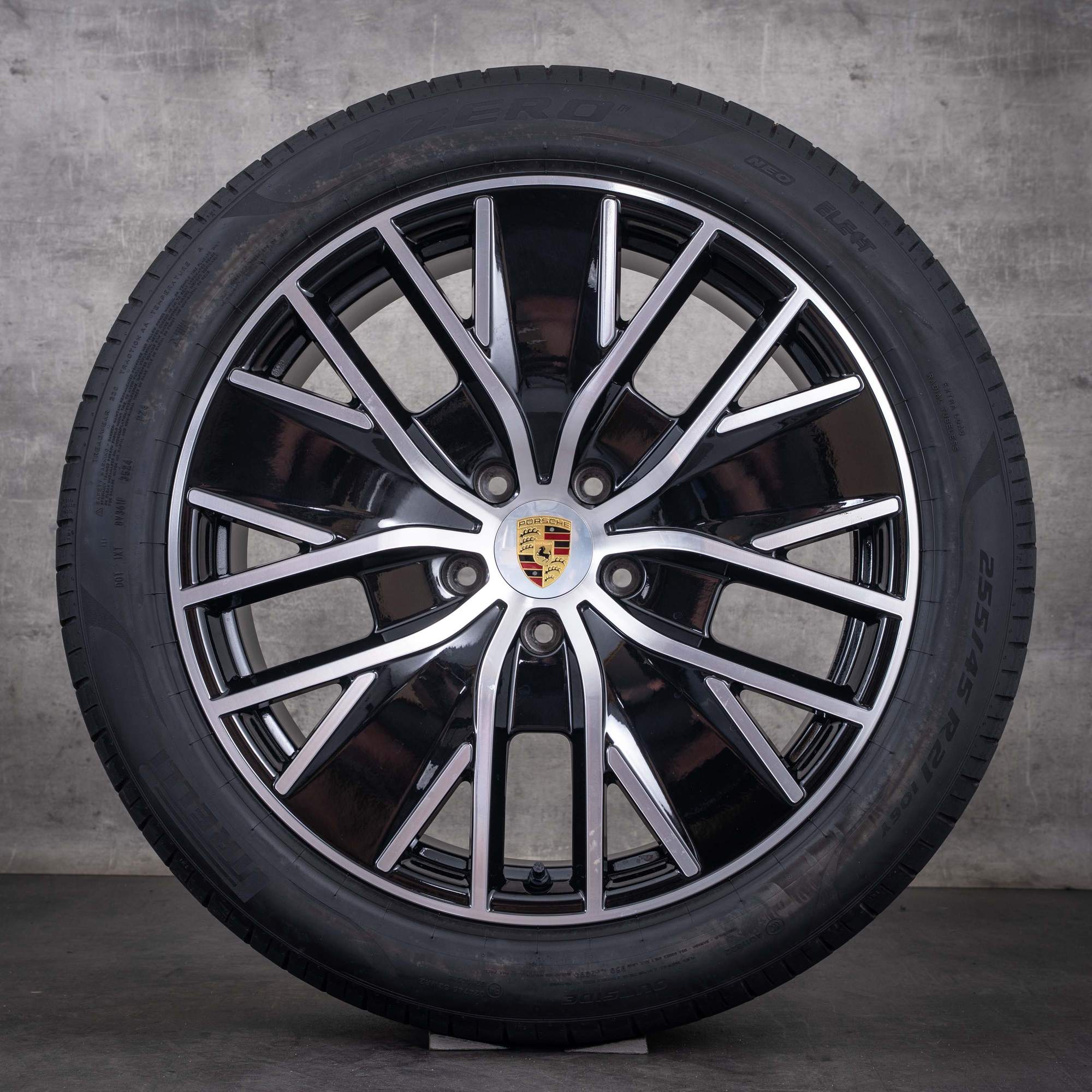 Oryginalne felgi Porsche Macan 21 cali H2 Electric – opony letnie 95C044660D czarne z efektem diamond cut