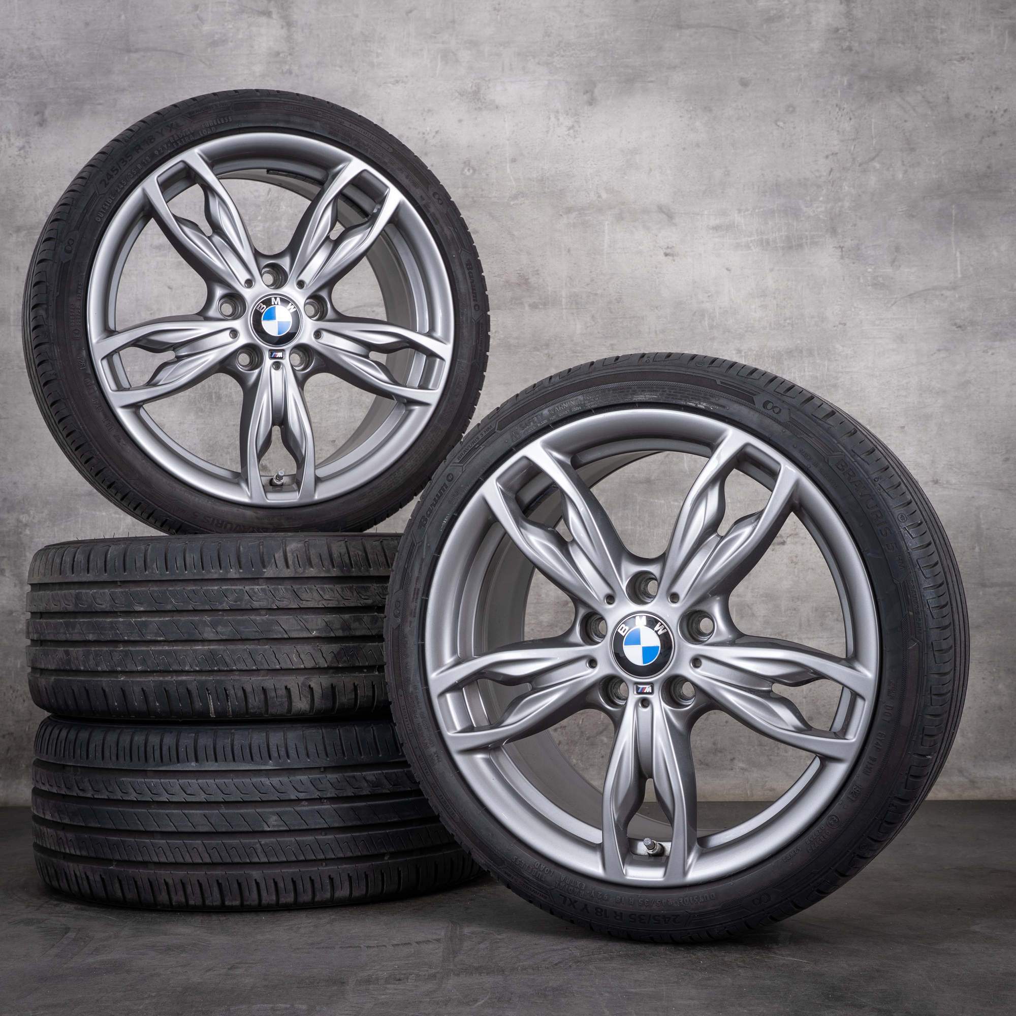 Oryginalne koła zimowe BMW serii 1 i Serii 2 18 cali F20 F21 F22 F23 felgi stylizowane 437 M 7847413 7847414 kolor orbit grey metallic