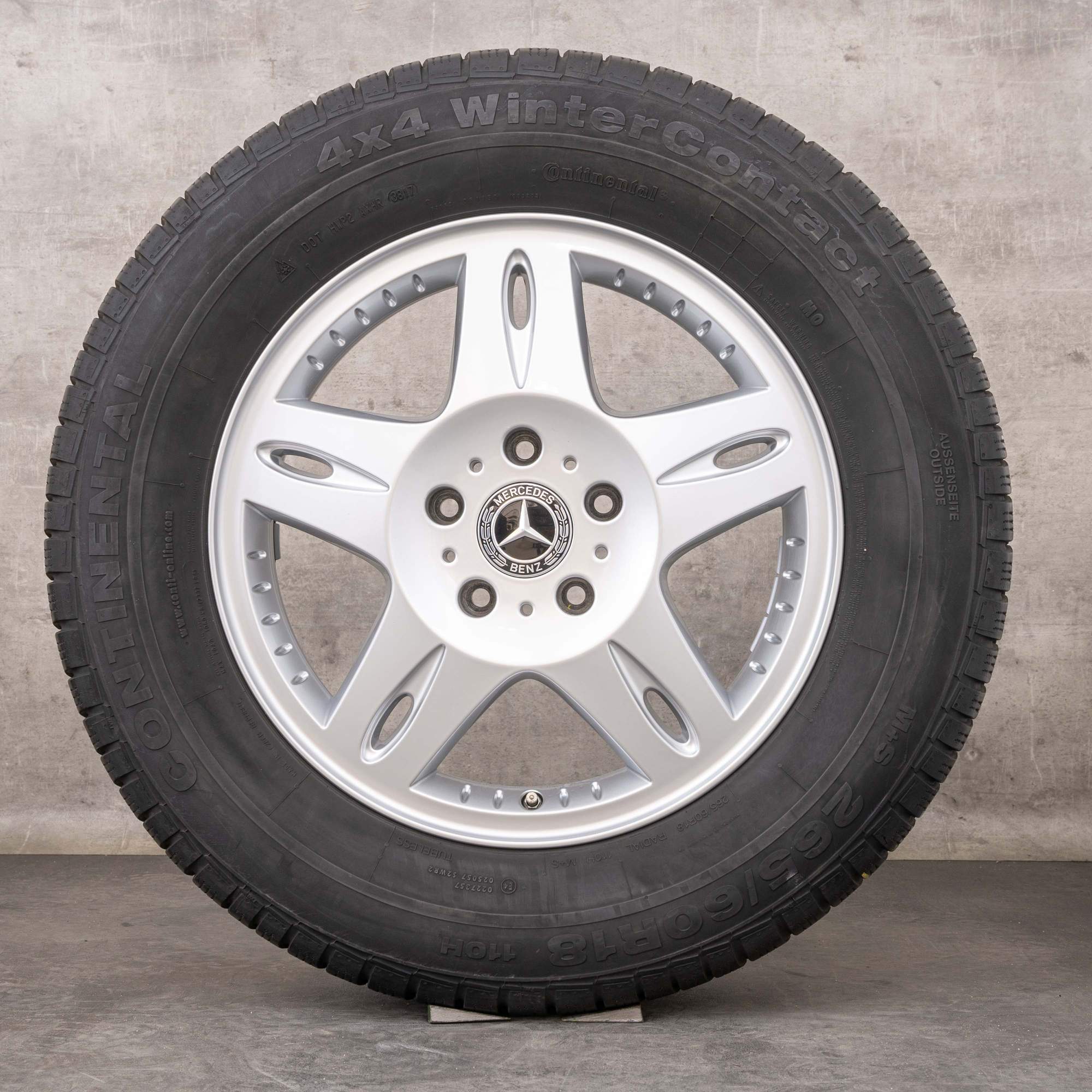 Oryginalne koła zimowe Mercedes Benz Klasa G AMG 18 cali felgi W463 A4634011202 srebrne błyszczące