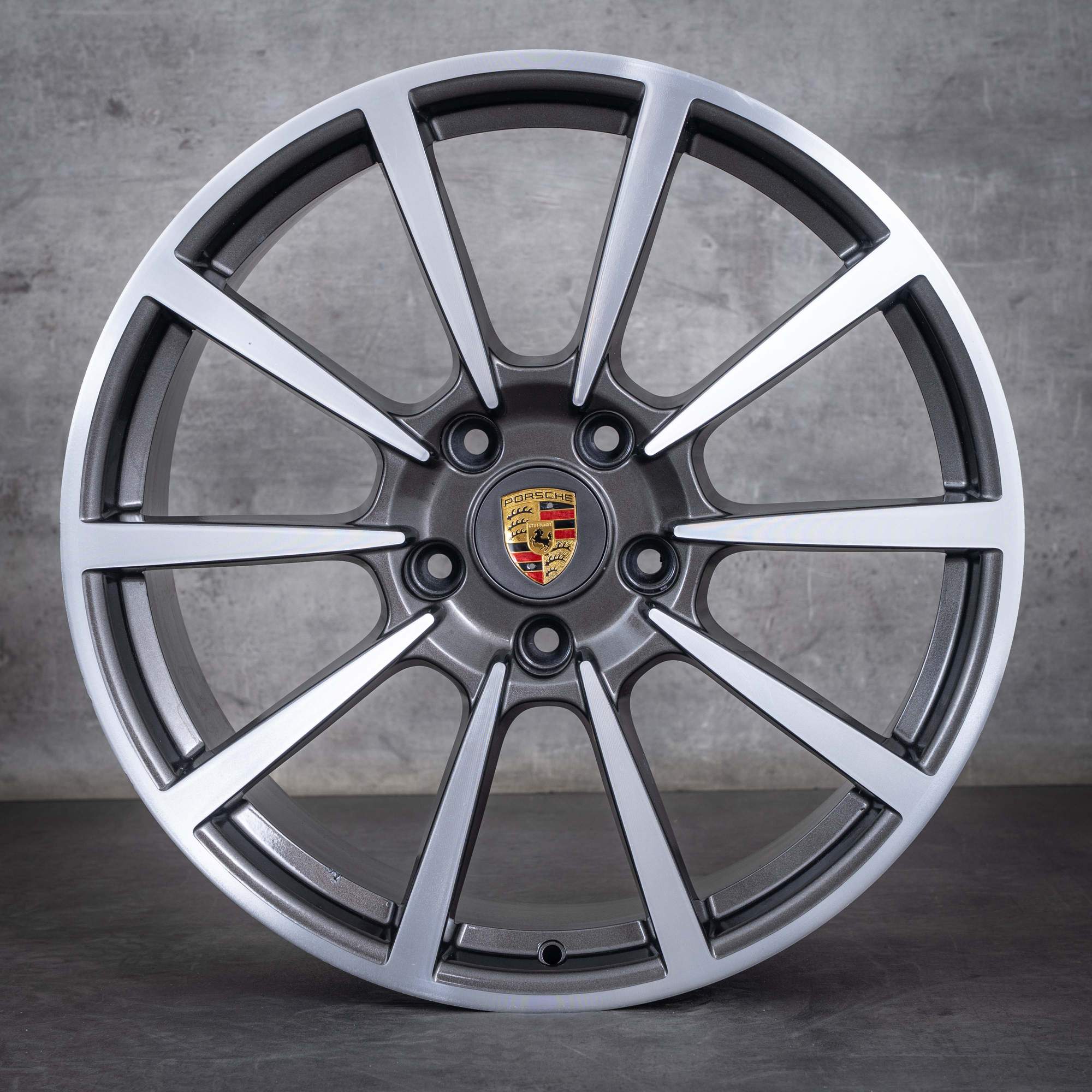 Oryginalne felgi Porsche 991 I 20-calowe koła letnie Carrera & S 99136216130 99136216630 polerowane tytanowe