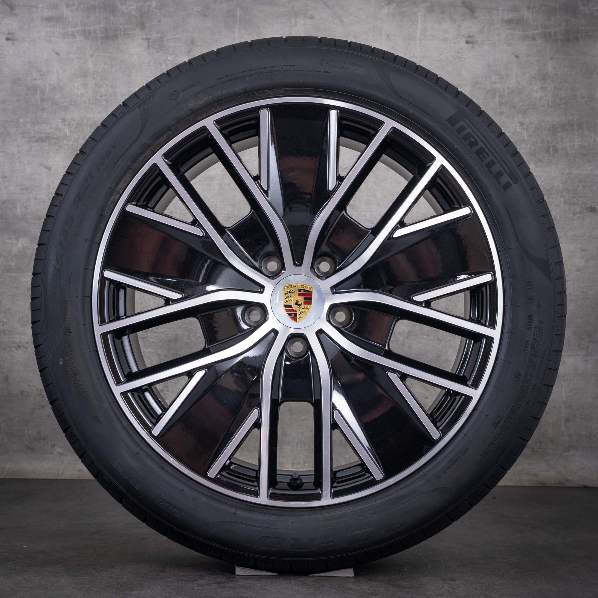 Oryginalne felgi Porsche Macan 21 cali H2 Electric – opony letnie 95C044660D czarne z efektem diamond cut