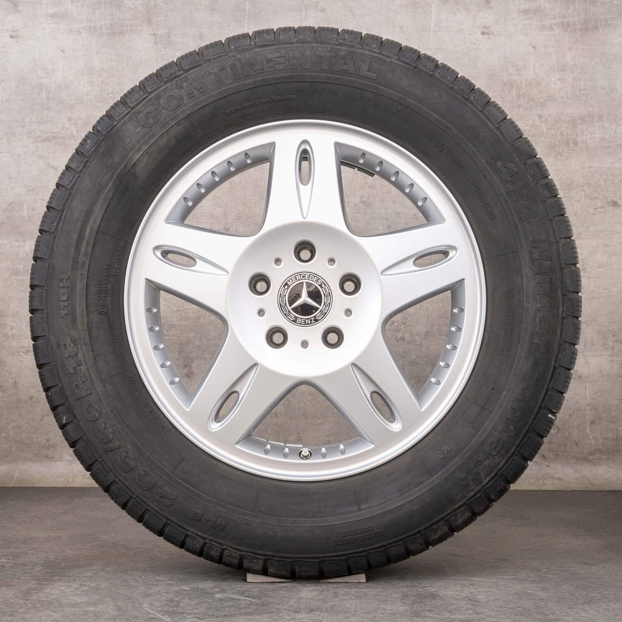 Oryginalne koła zimowe Mercedes Benz Klasa G AMG 18 cali felgi W463 A4634011202 srebrne błyszczące