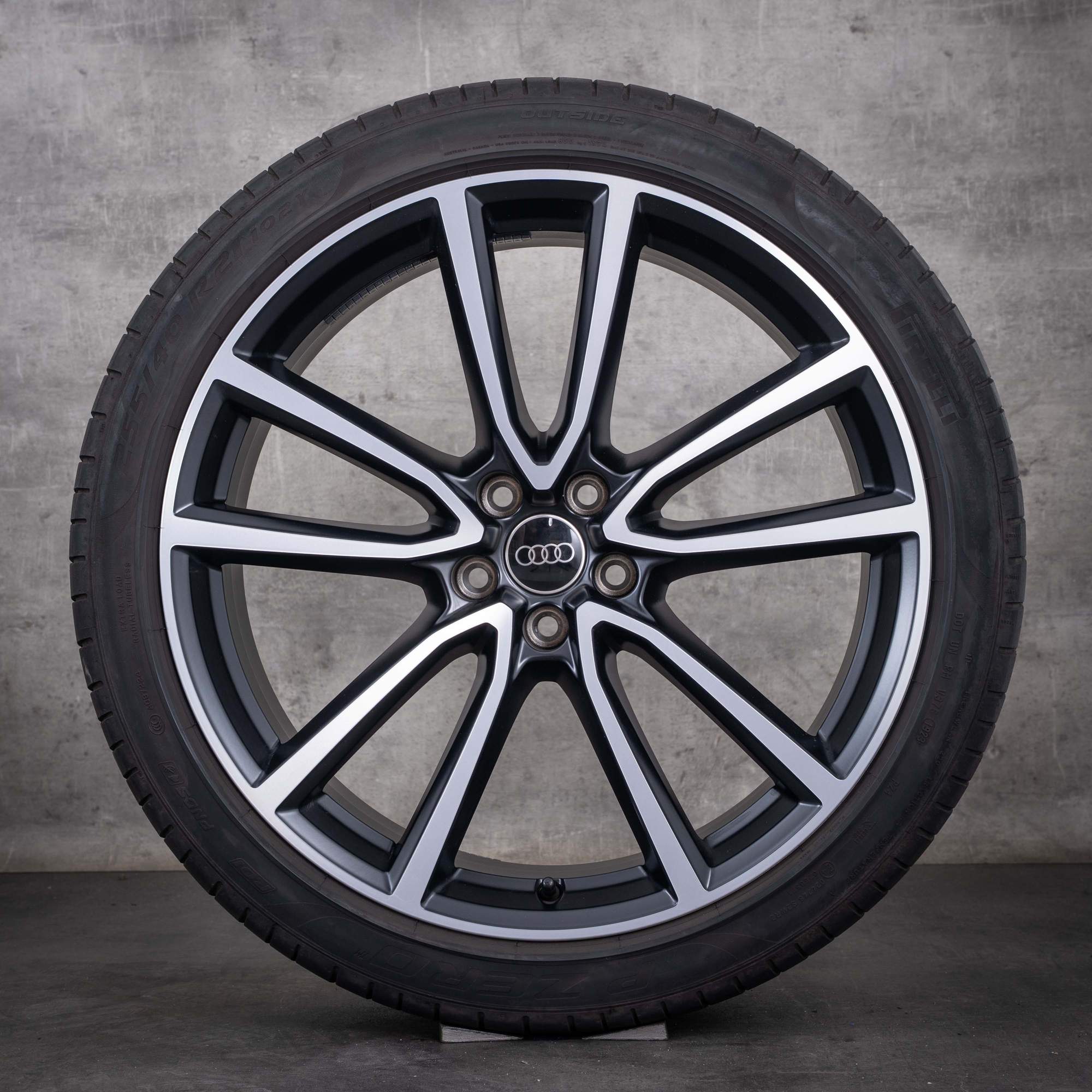 Oryginalne koła zimowe do Audi Q5 SQ5 felgi 21-calowe FY wzór Avius nr kat. 80A601025BG czarne matowe z efektem diamond cut