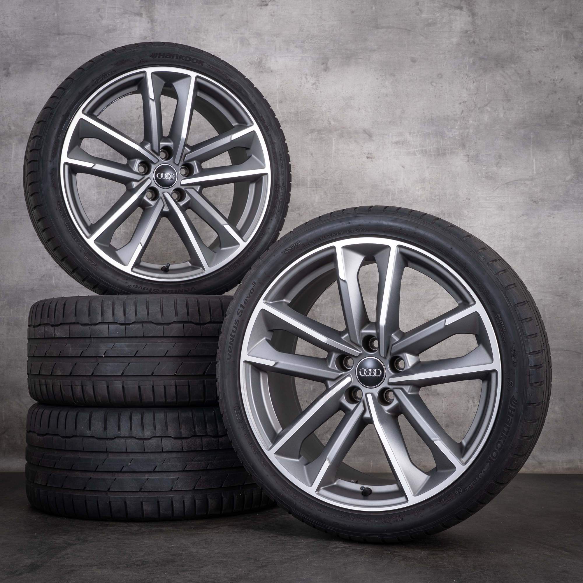 Oryginalne felgi do Audi A5 S5 19 cali 8W B9 F5 opony letnie 8W0601025DC tytan matowy przednia strona w technologii diamond cut