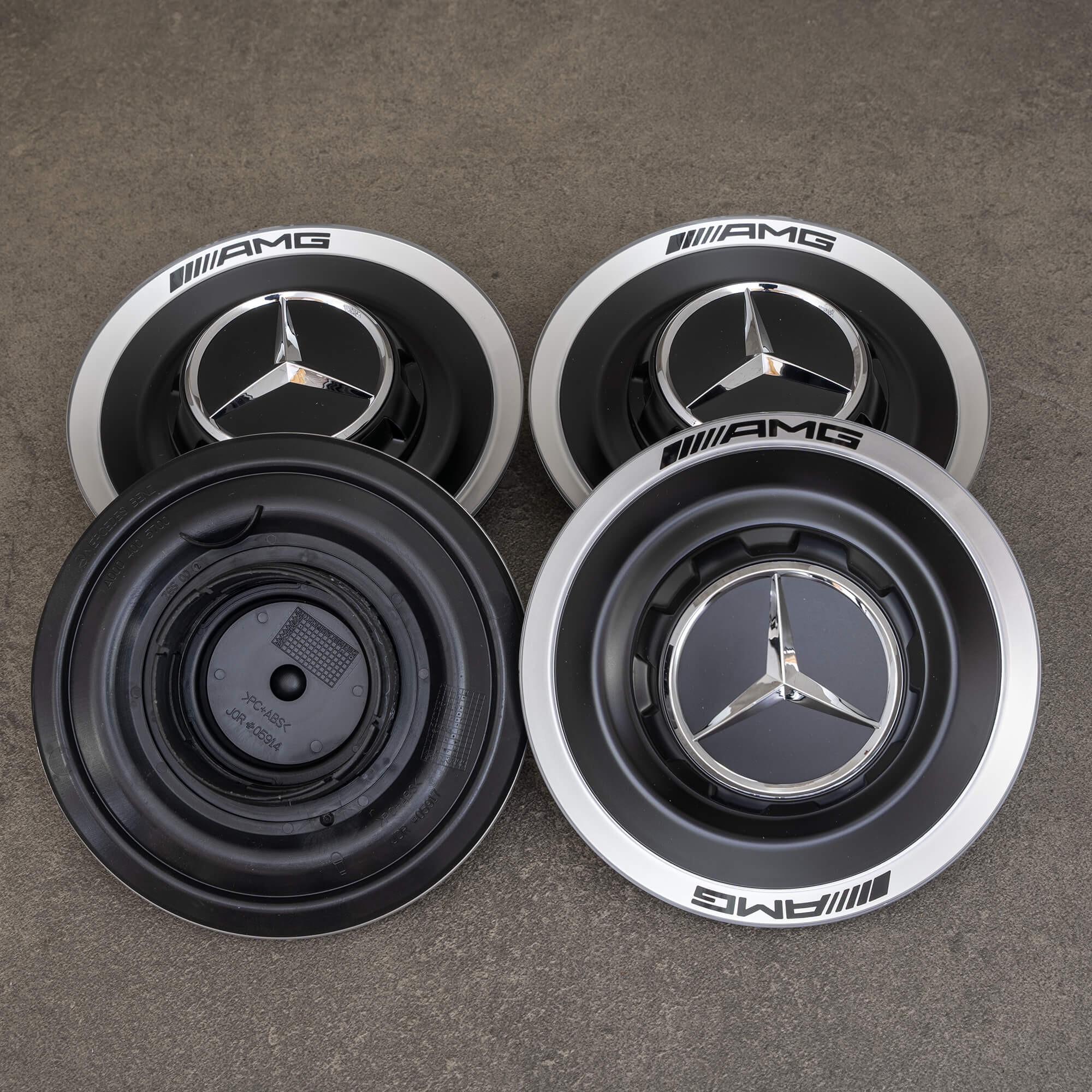 Oryginalna pokrywa piasty AMG do modeli Mercedes W177 W214 W223 V297 X294 – A0004005700 – NOWA