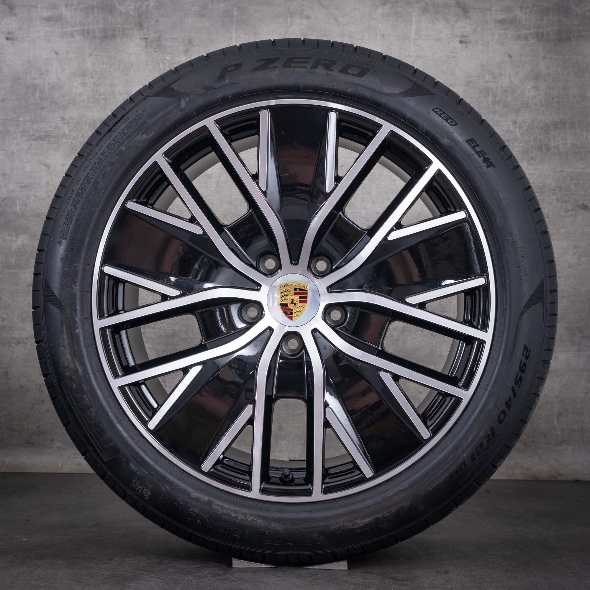 Oryginalne felgi Porsche Macan 21 cali H2 Electric – opony letnie 95C044660D czarne z efektem diamond cut